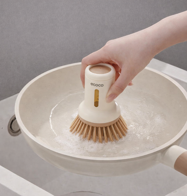 Squeezable liquid short handle pot brush