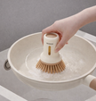 Squeezable liquid short handle pot brush