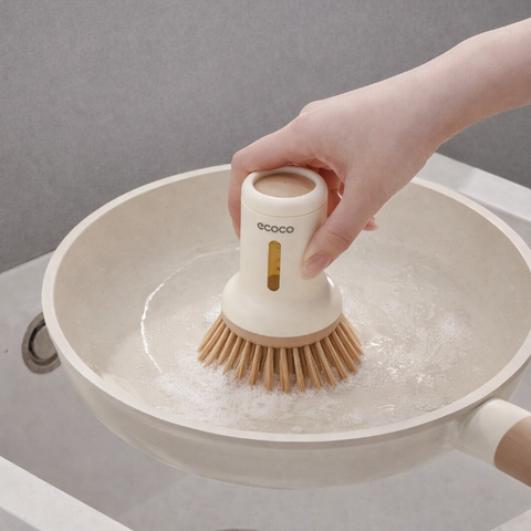 Squeezable liquid short handle pot brush