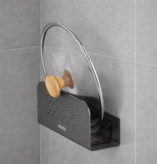 Wall mounted cutting board rack